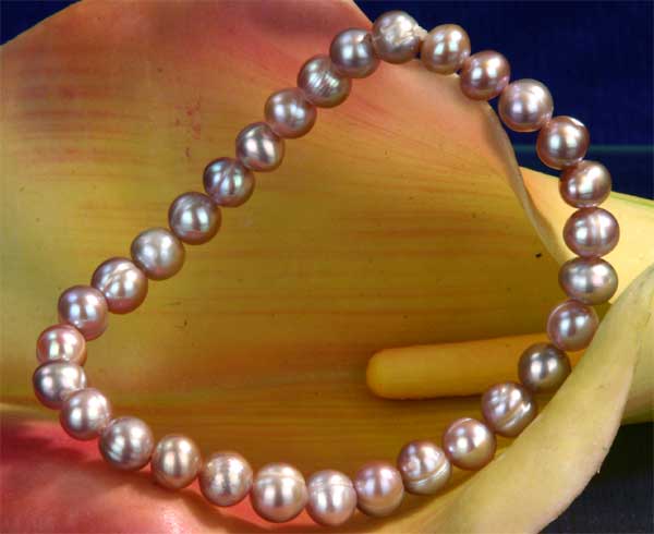 Süßwasser Zucht-Perlen-Stretch-Armband 6mm -hell-violett-